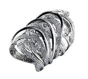 "Ocean" ring set in 18k white gold with diamonds in various cuts.