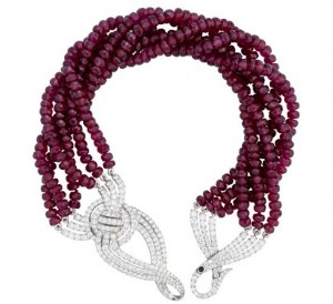 Entaglement" necklace with 6 strands of faceted ruby beads with diamonds set in 18k white gold.