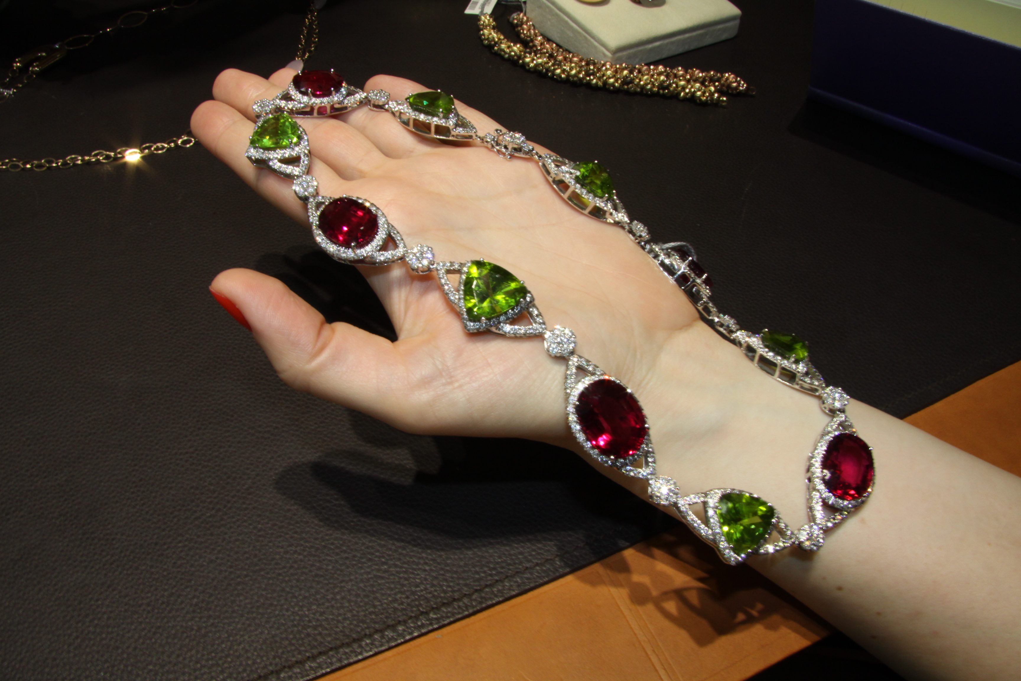 Cassetti necklace and ring set in white gold with rubellites and peridots and diamonds 