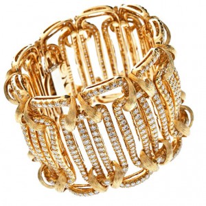 Henry Dunay wide bracelet set in 18k yellow gold with diamonds.