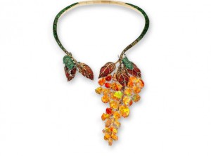 "Gardens of Xochimilco" necklace set in 18k black rhodium gold with sapphires, green garnets, fire opals.