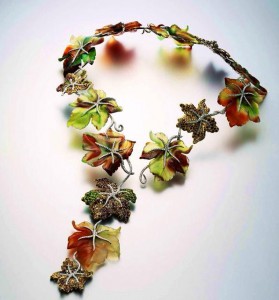 "Autumn leaves" necklace set in 18k white gold with agates, tourmalines, sapphires, spinels and spessartite garnets.