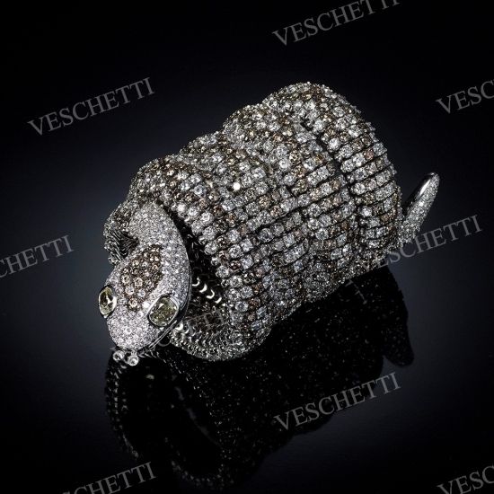 Arabian snake- a coiled sprung bracelet set with white and fancy brilliant-cut diamonds