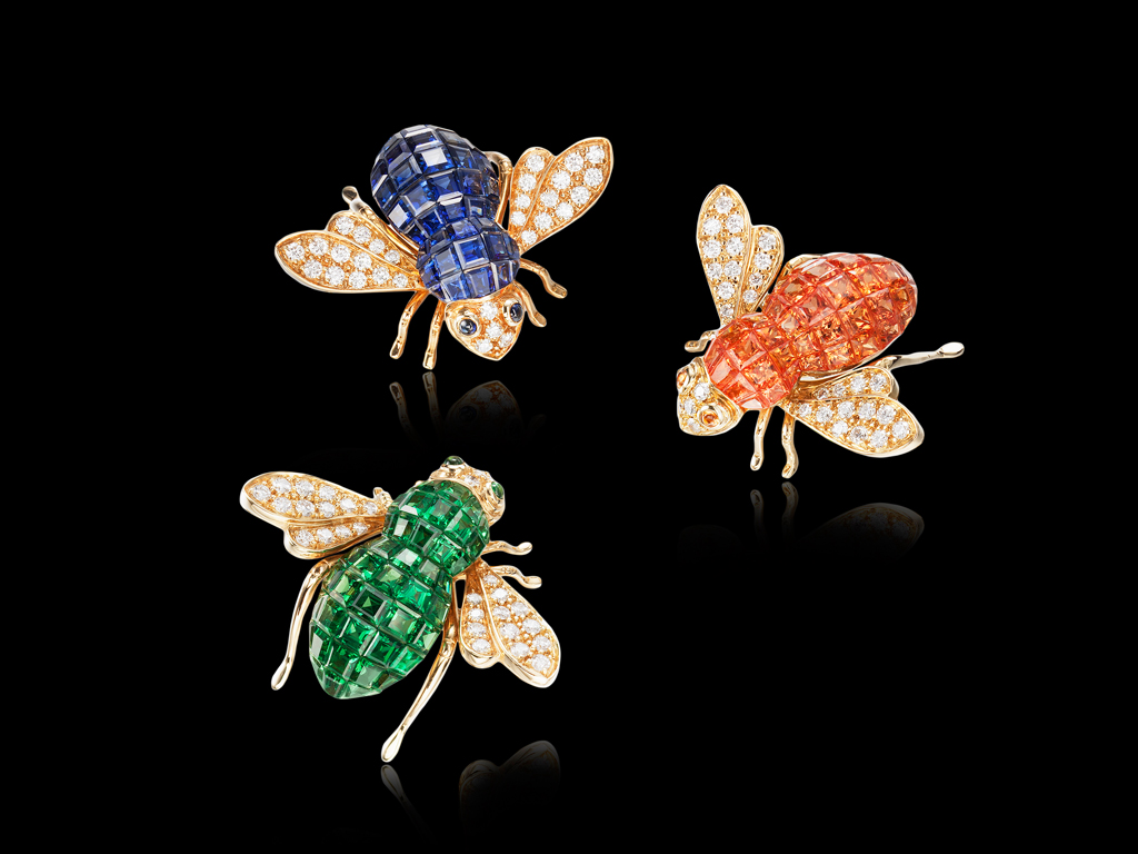 Iconic Bee brooches set in rose gold with orange and blue sapphires, green garnet and diamonds-invisible setting