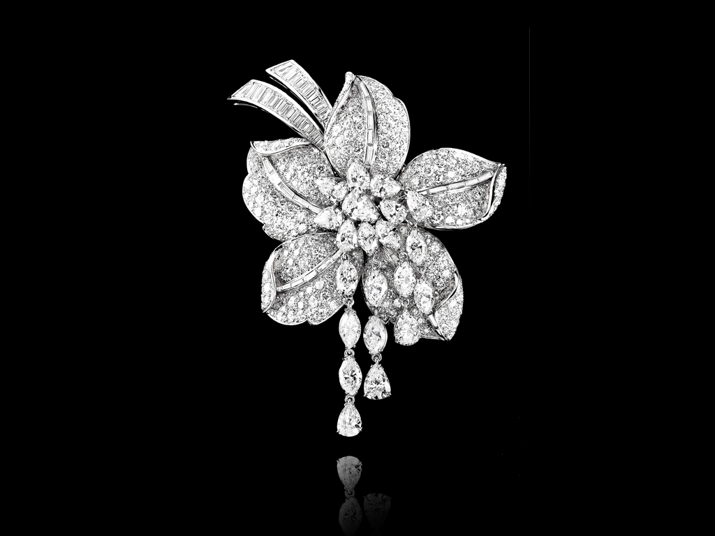 Magnificent Flower brooch set in platinum with baguette-cut, pear-shaped and marquise-cut diamonds cascade, High Jewellery collection