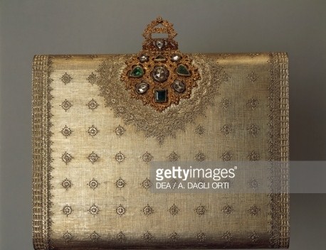 Make-up case in silver engraved with ribbon motif and ornamented with gold and rubies, 1945-1949, Mario Buccellati