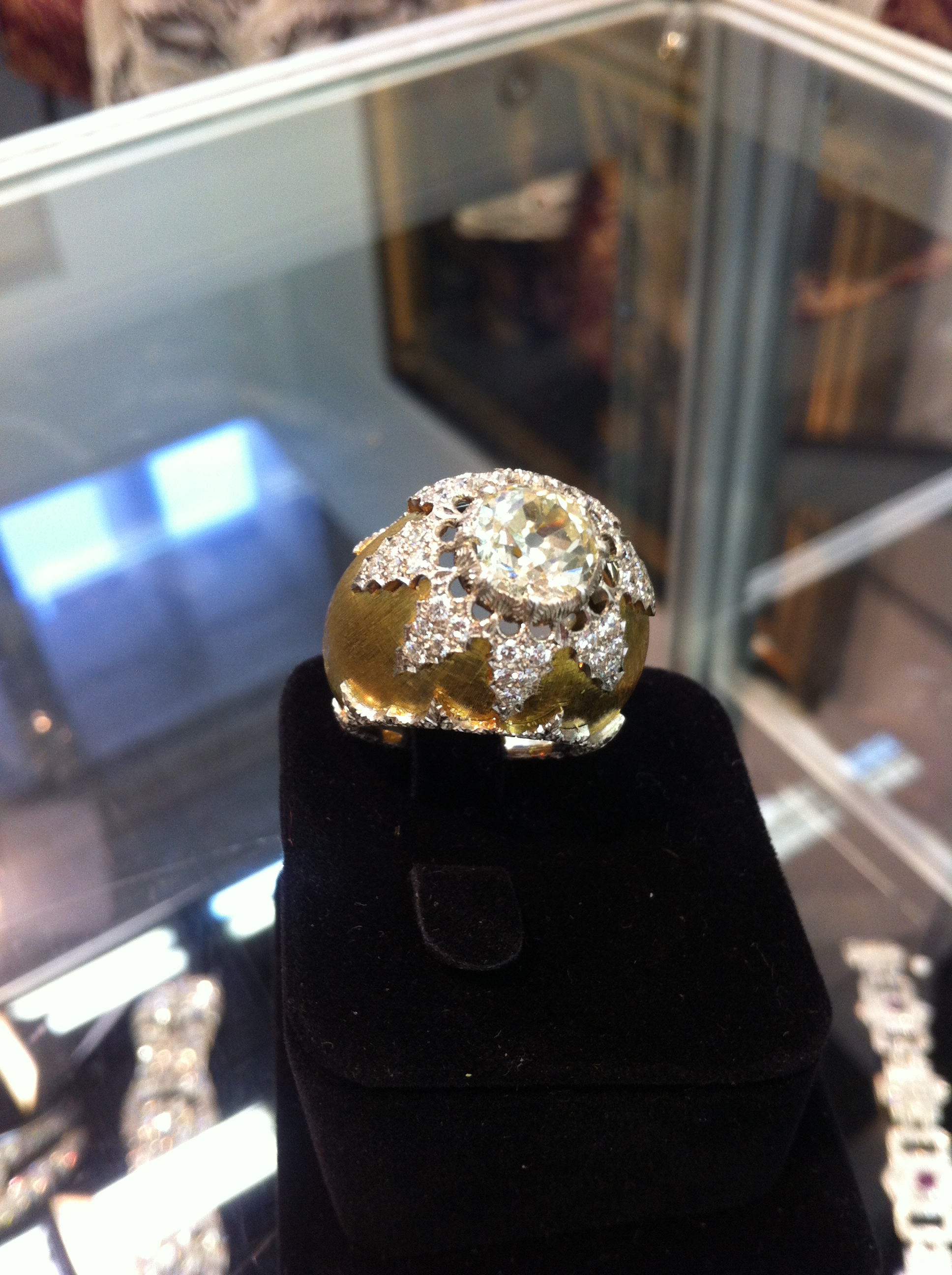 This wonderful ring features two of the trademark Buccellati techniques: the satin-like gold “Florentine” finish, and the two-tone gold diamond set lattice design, 1960s, Mario Buccellati