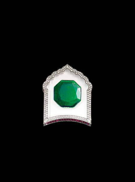 Brooch in gold, set with emerald, diamonds, rubies, rock crystal and white agate, JAR, 2002. The Al-Thani Collection.