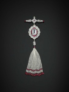 Pendant brooch in platinum, set with diamonds and rubies, with diamond and ruby beads,Viren Bhagat, 2011. The Al-Thani Collection.