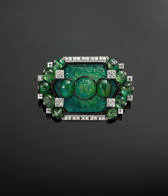 Brooch in platinum, set with emeralds, diamonds and enamel. Cartier, circa 1925, modified by Cartier in 1927. The Al-Thani Collection.