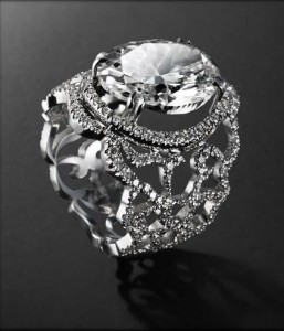 Fantasme ring set in white gold with oval-shaped diamond and diamonds pave', Leysen Joaillier