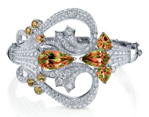 Couture cuff set in white gold with diamonds pave' and pear-shaped, trillion and round cut zultanites, Stephen Webster